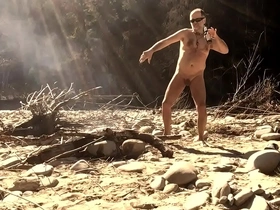 Nudist dancer at the campfire