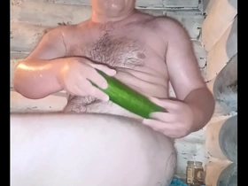 A russian guy fucked his fat ass with a cucumber! and even jerked off at the same time.his friends filmed it on a hidden camera.that's how they found out he was gay)))))